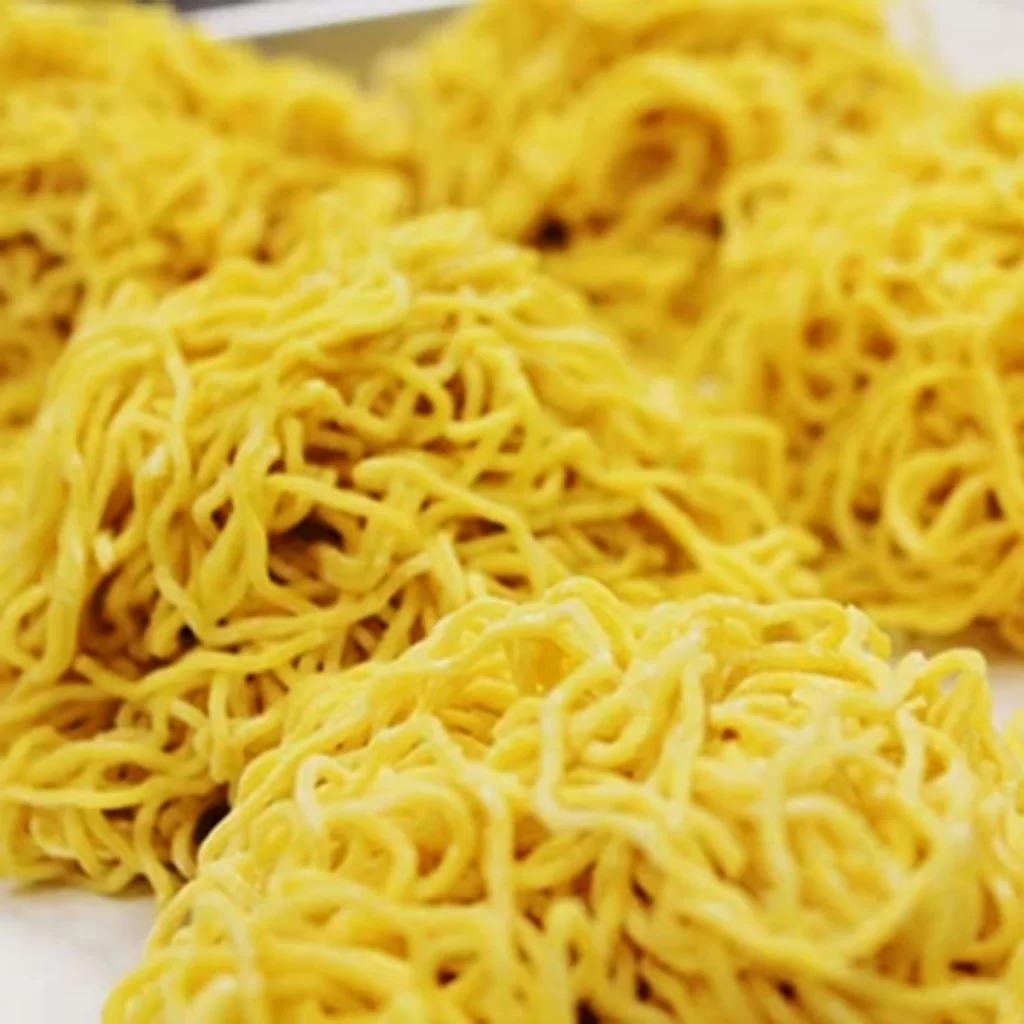 Fresh uncooked yellow ramen noodle blocks in bulk at Ichiddo Ramen, Ramen Restaurant in Poughkeepsie