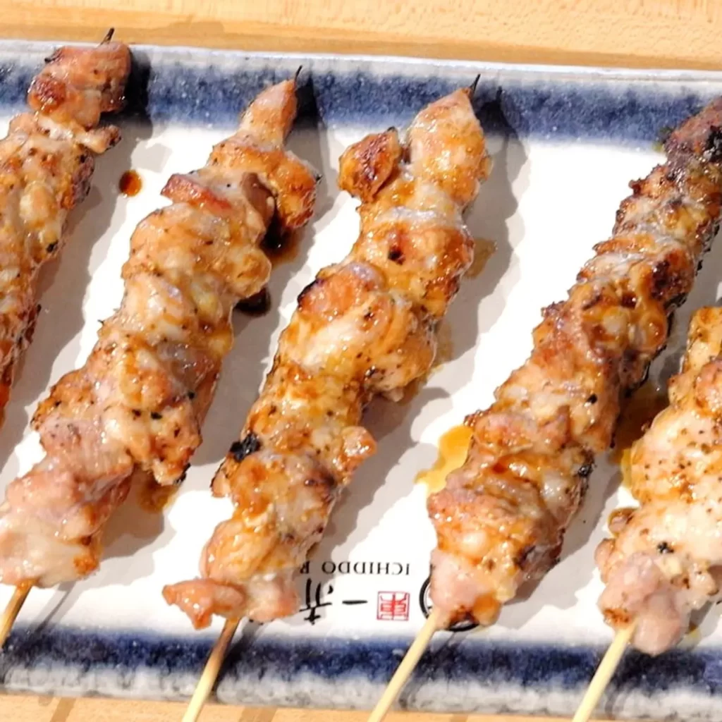 Grilled savory chicken yakitori skewers ready to serve at Ichiddo Ramen, Ramen Restaurant in Poughkeepsie