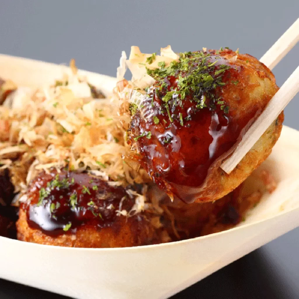Sauced takoyaki topped with bonito flakes and seaweed at Ichiddo Ramen, Ramen Restaurant in Poughkeepsie