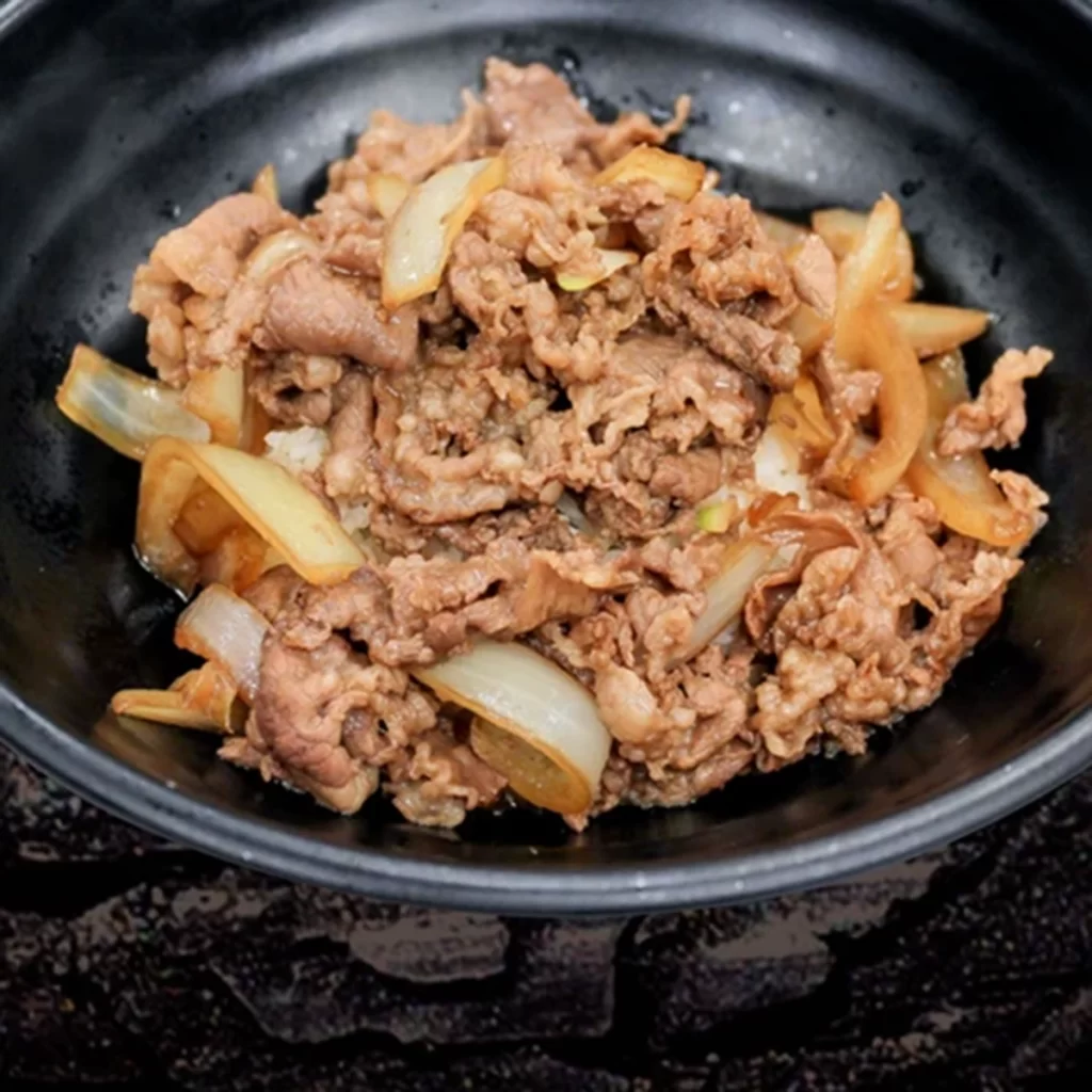 Savory beef rice bowl cooked with sweet onion at Ichiddo Ramen, Ramen Restaurant in Poughkeepsie