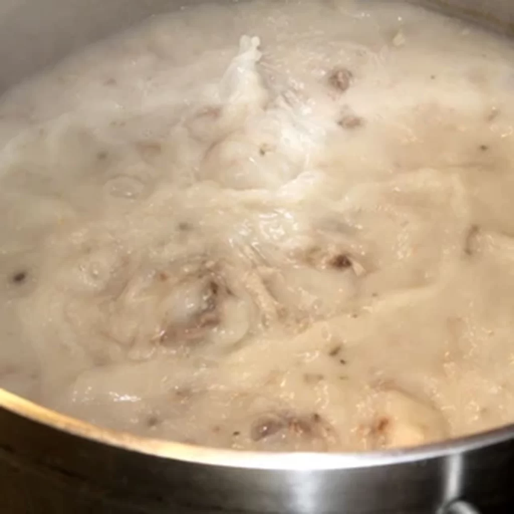 Simmering creamy pork bone broth for house ramen at Ichiddo Ramen, Ramen Restaurant in Poughkeepsie